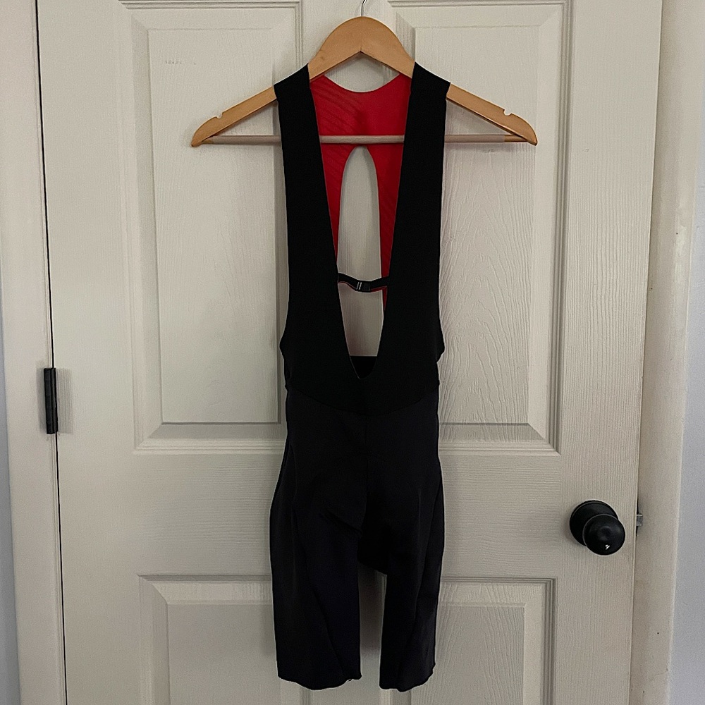 Black Pactimo women's cycling bib shorts, size XS.